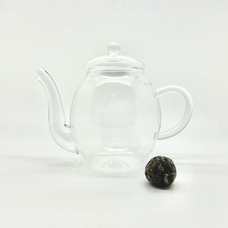 Théière en verre transparent pour fleur de thé magique